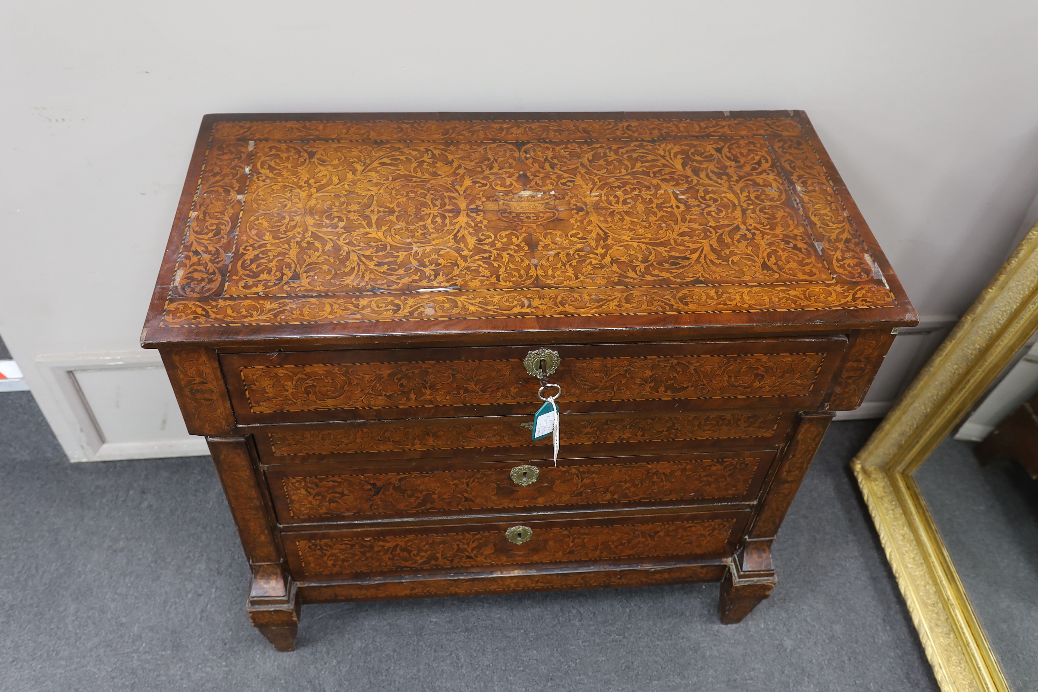 An early 19th century Dutch floral marquetry walnut commode, width 98cm, depth 49cm, height 90cm